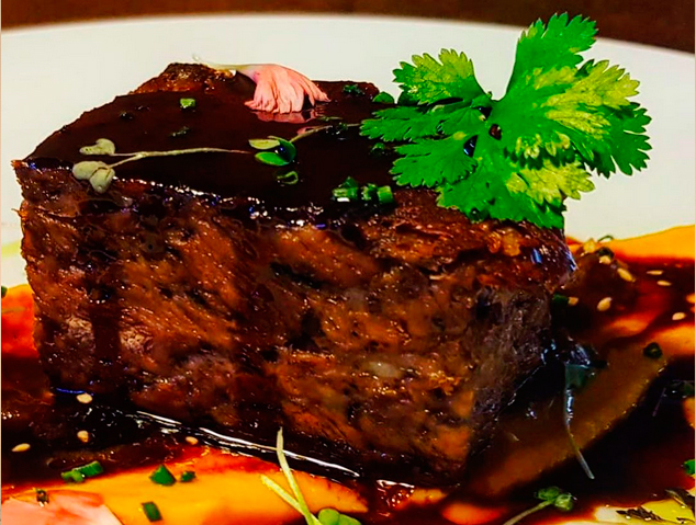 Melós de xai desossat amb escuma de sidra del restaurant Els Garrofers